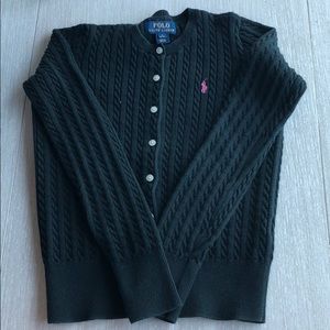A black polo sweater